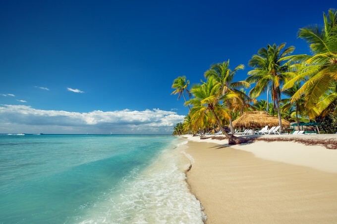 Paradise tropical island beach with perfect sunny sky